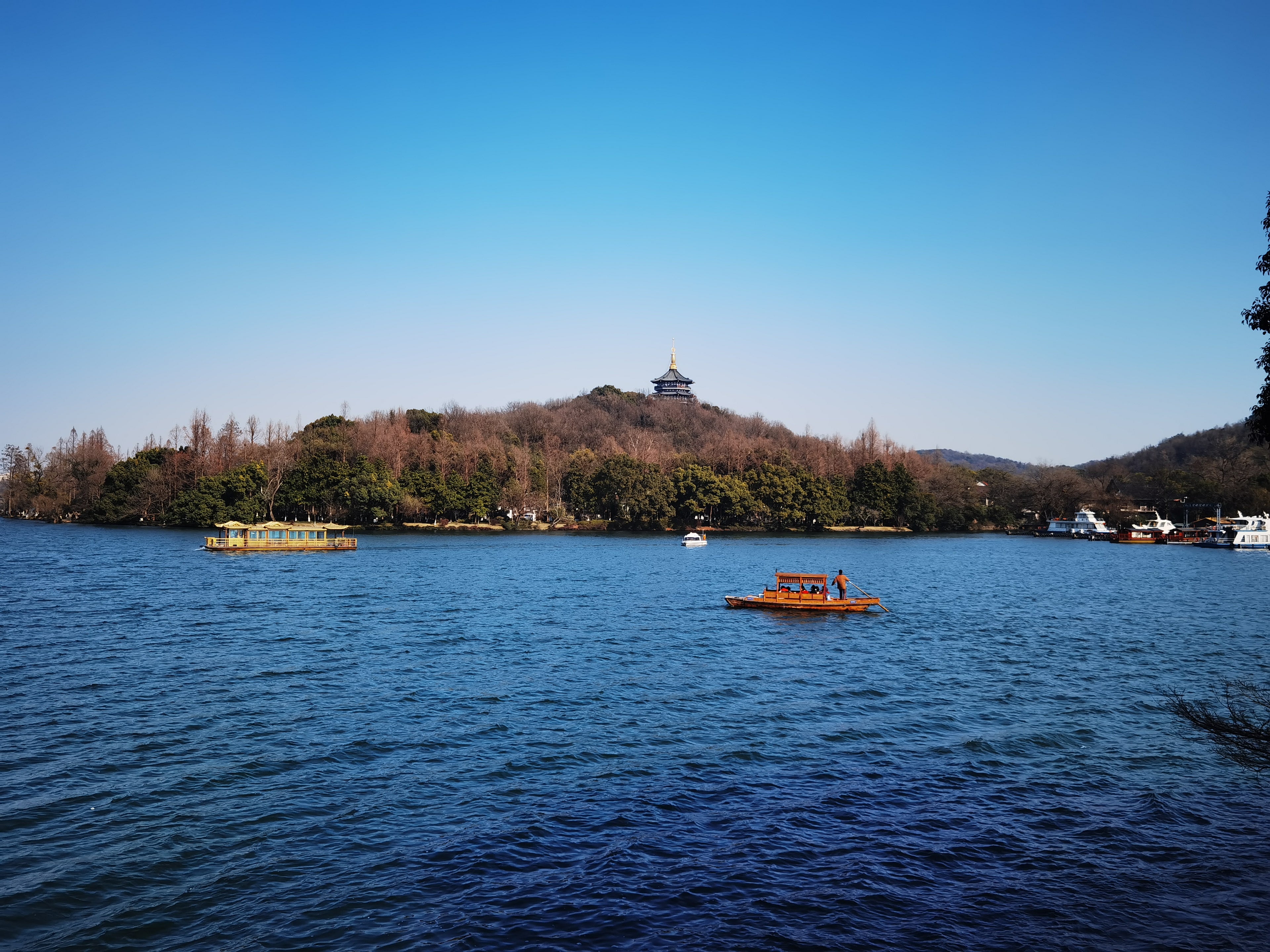 Leifeng Pagoda, boats and the West Lake landscape in Hangzhou