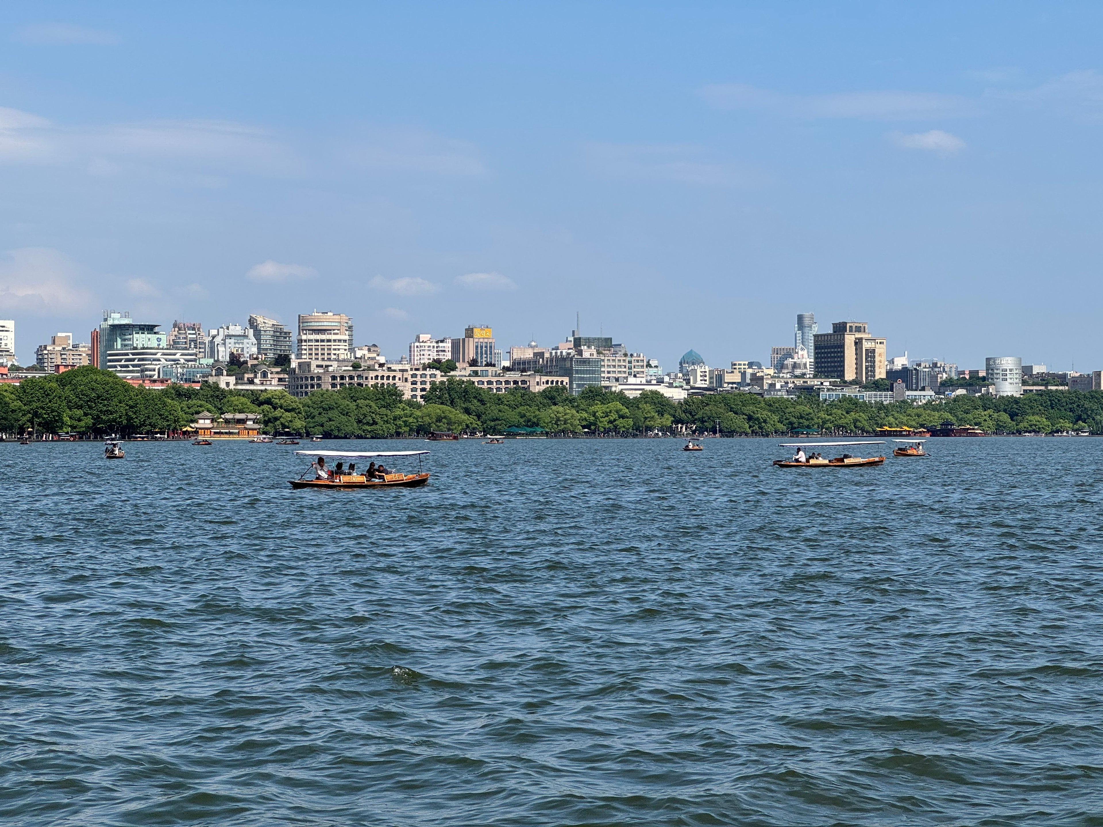 A real West Lake cruise boat on the water in Hangzhou